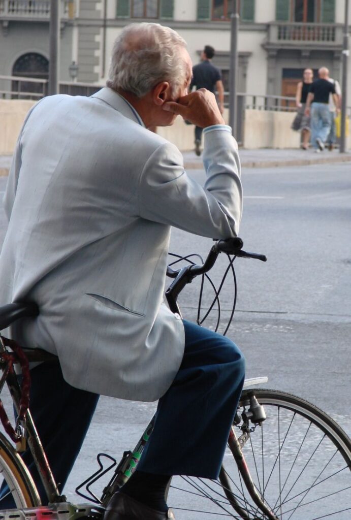 Pondering Cyclist in Italy